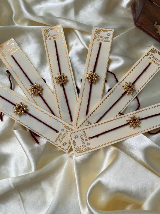 Golden flower Rakhi( pack of 6 Rakhi’s )