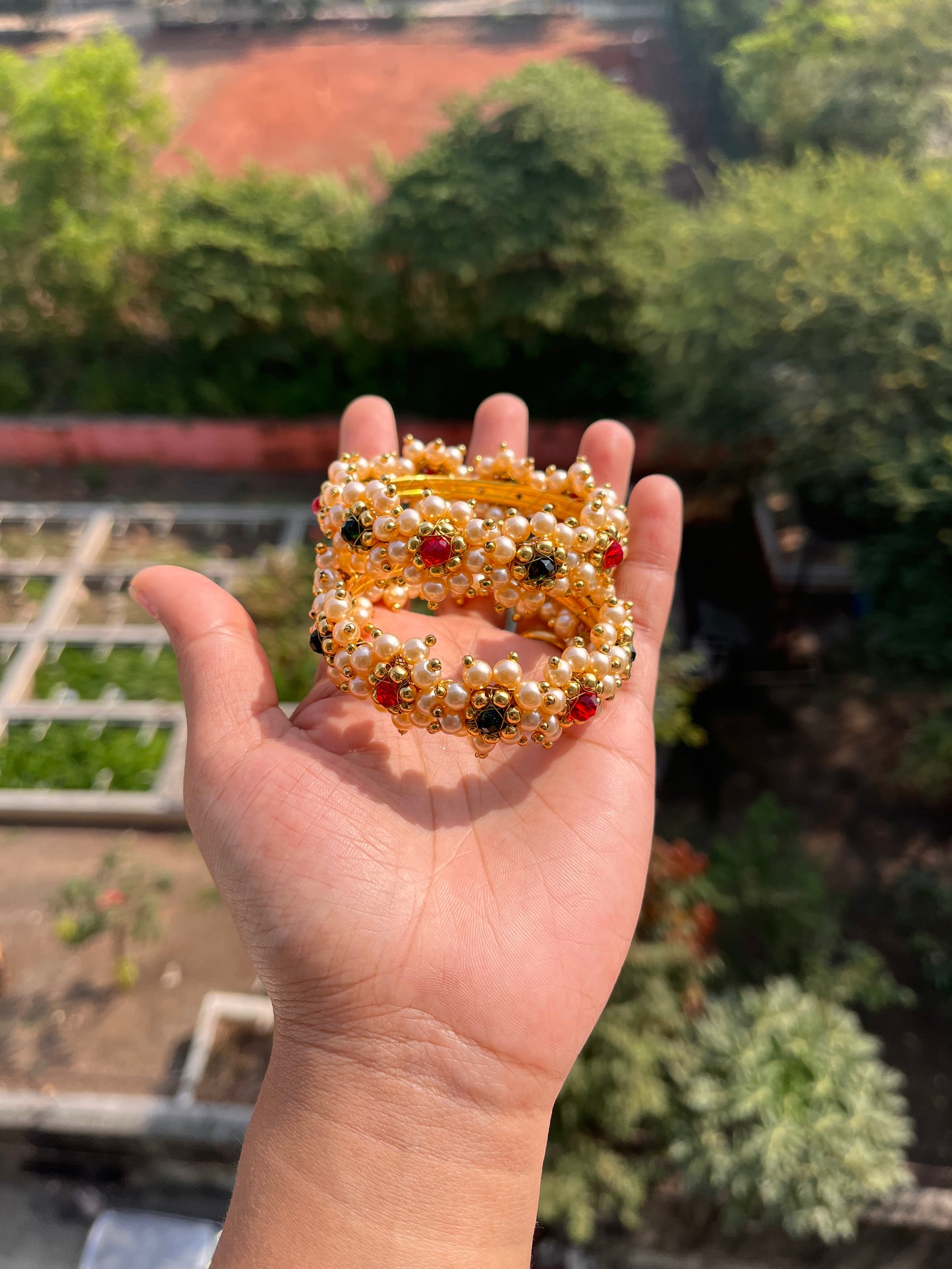 Golden pearl bangles