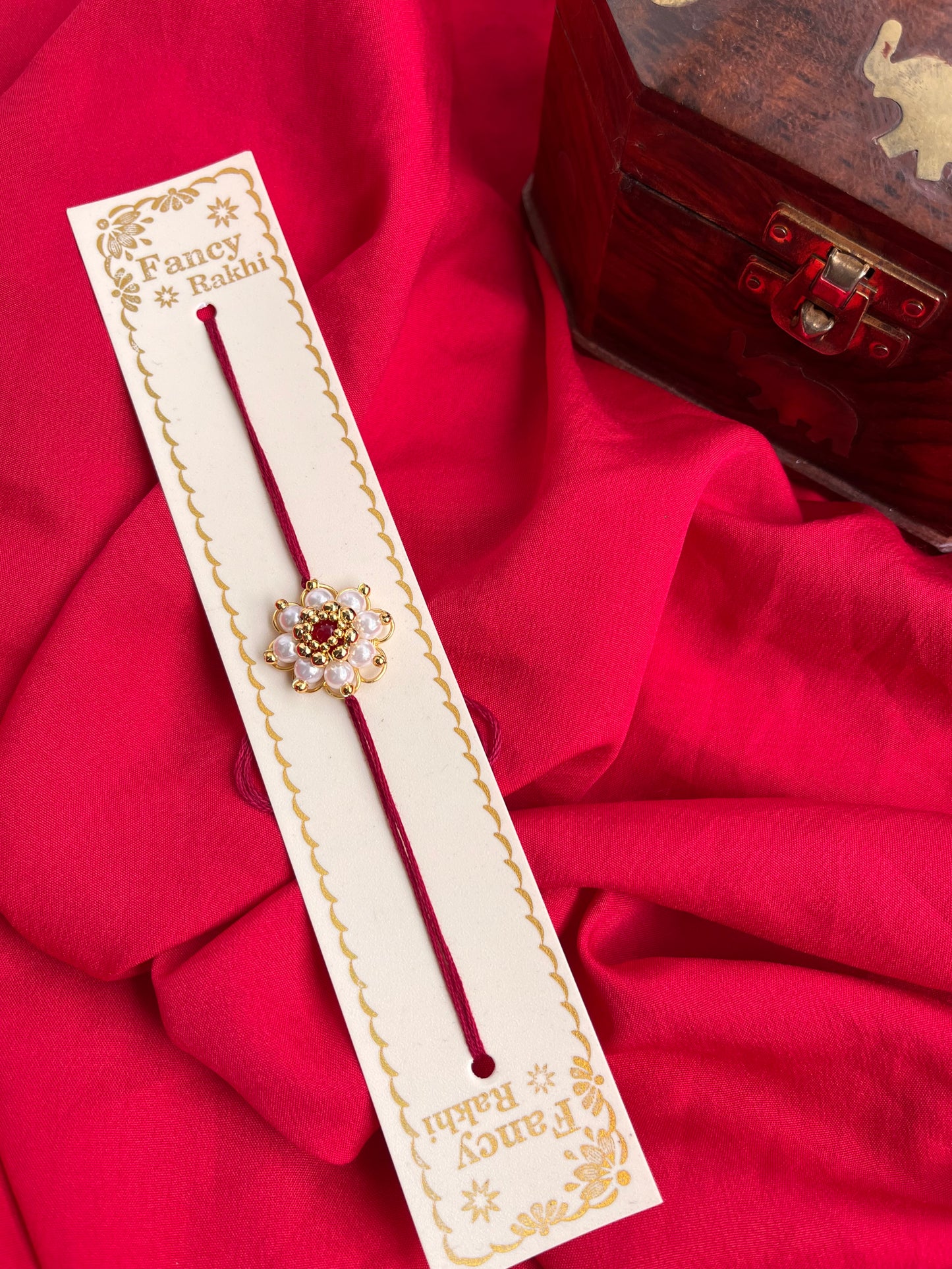 Pearl flower Rakhi