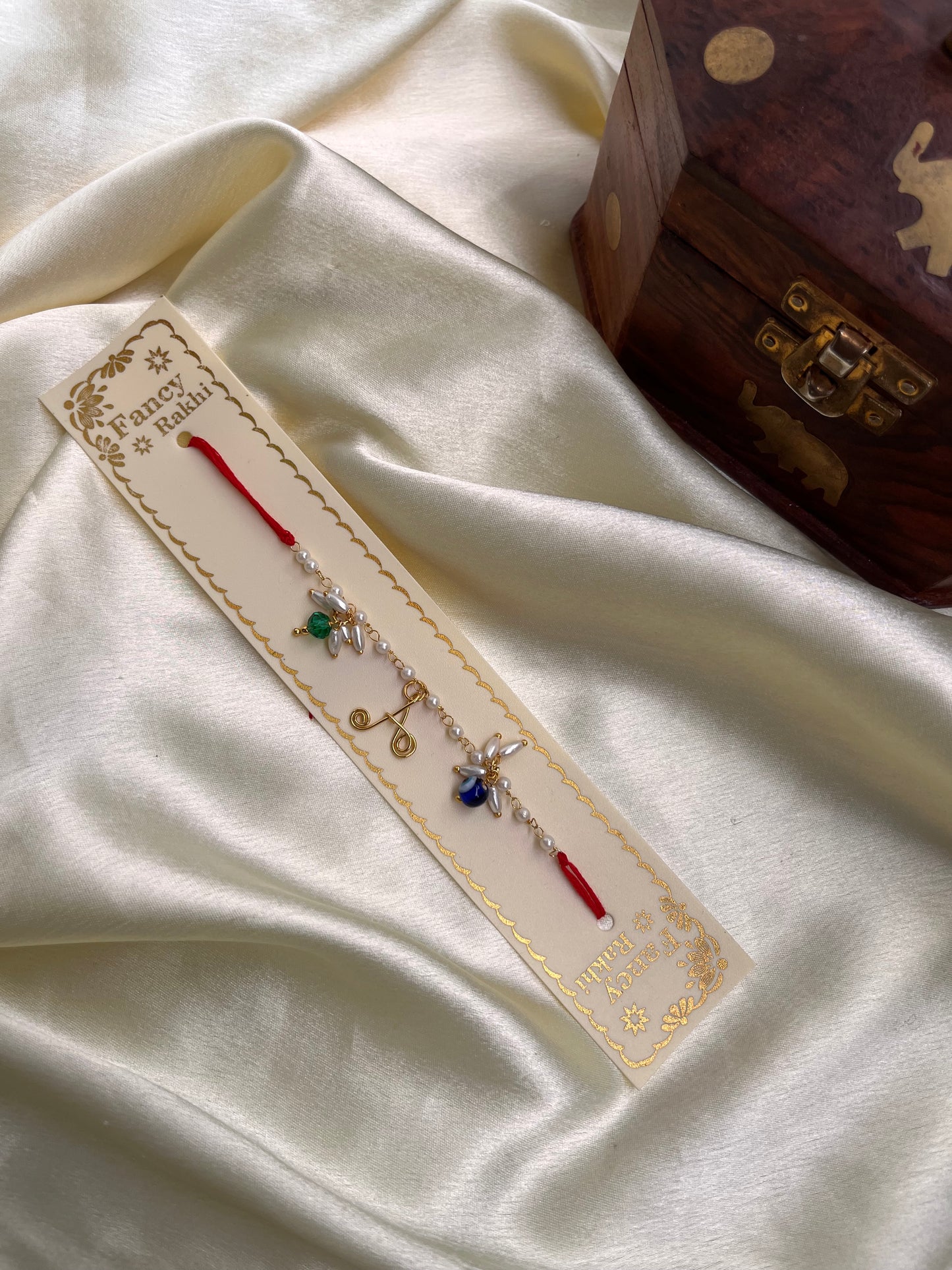 Name initials Rakhi with evil eye beads