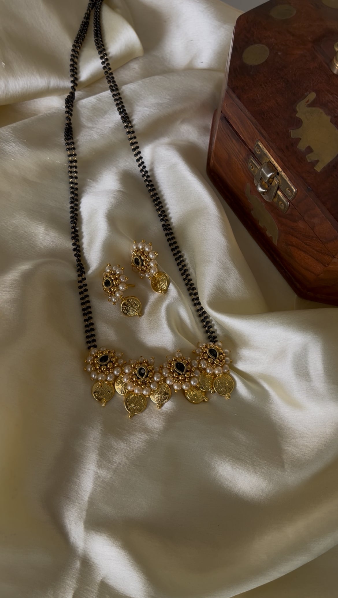 Golden pearl putali mangalsutra